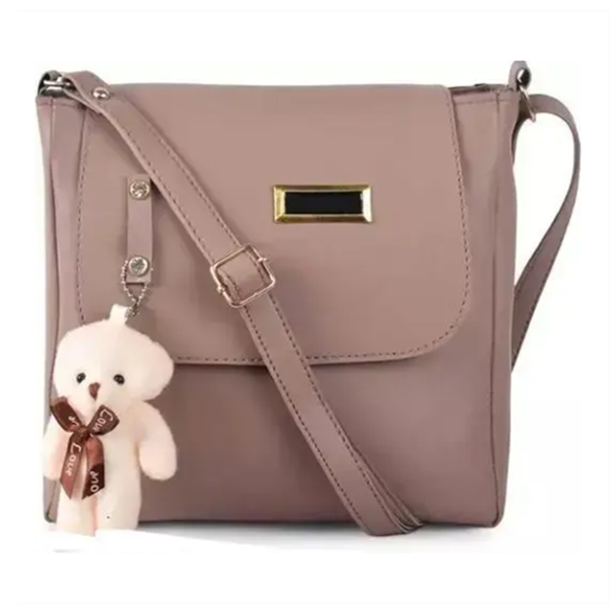 woman siling cross body bag teddy mause 